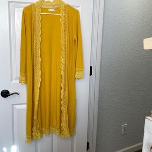 Long yellow cardigan with yellow lace trim